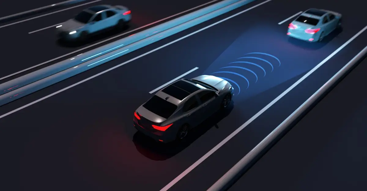 Autonomous cars with teledriving technology on a dark highway, showcasing wireless communication signals for remote navigation.