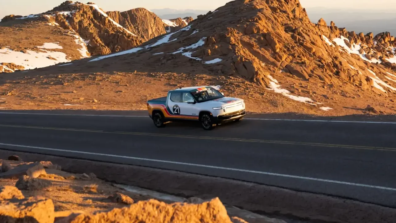 Rivian electric pickup truck on a mountainous road - unknown car brands